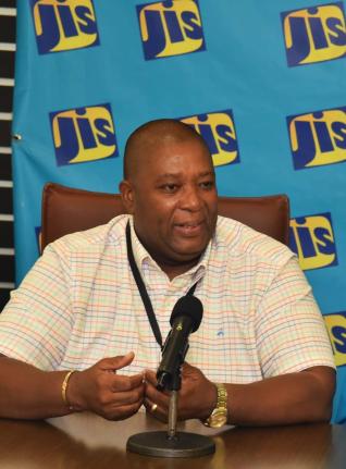 Director general of the International Centre for Environmental and Nuclear Sciences (ICENS), Professor Charles Grant, addresses a JIS Think Tank on August 20.
