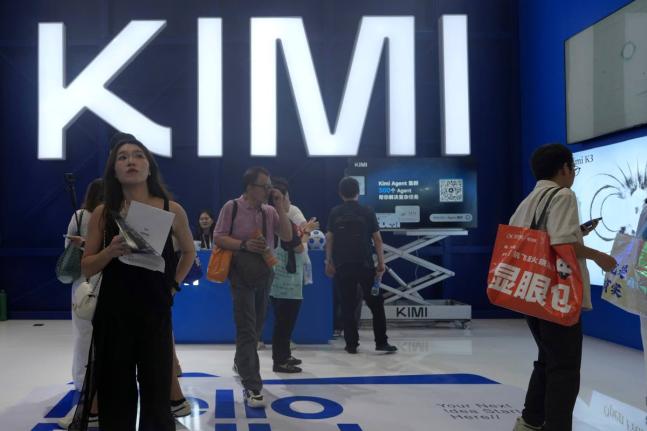 Visitors at the booth for Chinese AI Startup Moonshot’s Kimi K3 during the World AI Conference in Shanghai, China, on July 17, 2026. 