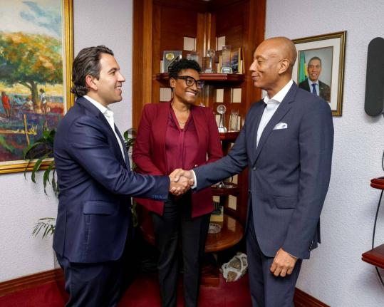 Jabar Singh (left), president, Scotiabank Dominican Republic and the Caribbean, is introduced to David Lowe, managing director of the Development Bank of Jamaica by Audrey Tugwell Henry, president and CEO, Scotia Group Jamaica.