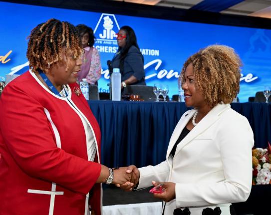 La Sonja Harrison (left), the newly installed president of the Jamaica Teachers’ Association, and Dr Dana Morris Dixon, minister of education, skills, youth, and information, in conversation on the third and final day of the association’s 62nd annual c