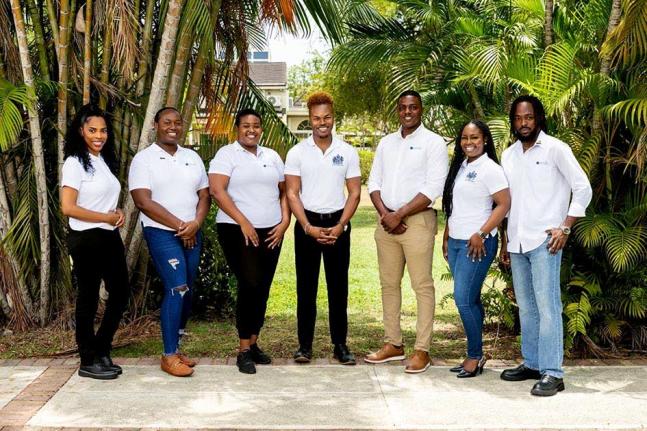 From left: Melisha Gordon (Chevening Scholar); Lamar-Shey Grant (Commonwealth Scholar); Emoney Clayton (Commonwealth Scholar); Akeem Campbell (Chevening Scholar); Ricardo Hunter (Commonwealth Scholar); Shaqkeera Douglas (Chevening Scholar); and Jerome Garw