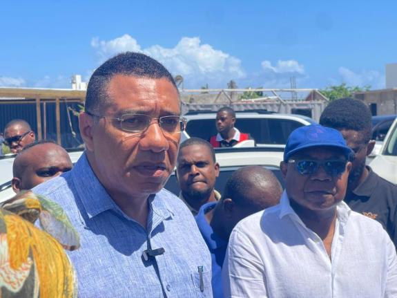 Prime Minister Dr Andrew Holness meeting with residents of Cooper’s Pen, Trelawny, on Friday. – Ashley Anguin photo