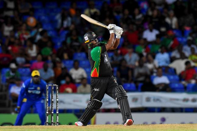 St Kitts and Nevis opening batsman, Johnson Charles strikes on his way to 78 against the Barbados Tridents a Warner Park on Tuesday night.
