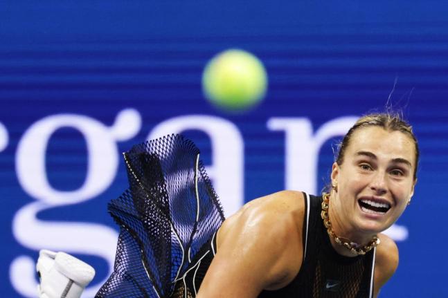 Aryna Sabalenka of Belarus serves to Polina Iatcenko of Russia, during the second round of the US Open tennis championships yesterday.