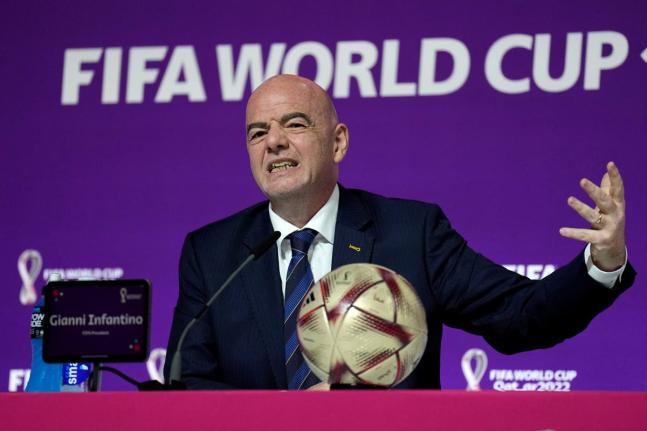   FIFA President Gianni Infantino gestures as he meets the media at the FIFA World Cup closing press conference in Doha, Qatar, Friday, December 16, 2022.  