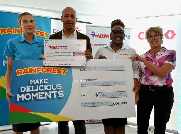 
From left: Jacqueline Hamilton, chairperson of Committee for the Upliftment of the Mentally Ill (CUMI); Miguel Beckford, branch manager at Fairview, Jamaica Money Market Brokers (JMMB); Ophelia Wright, sales executive, Rainforest Seafoods; and Debbie Louw
