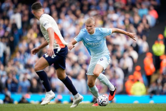 
Manchester City’s Erling Haaland (right) in action during the English Premier League football match against Coventry City in Manchester, England, yesterday.