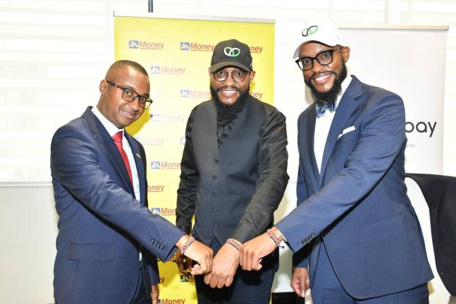 Horace Hines (left), general manager, JN Money Services, shares a moment with co-founders of WapiPay, Edward Ndichu (right) and Paul Ndichu following the signing of their partnership agreement with the Kenya-based company to support payments to Jamaica thr