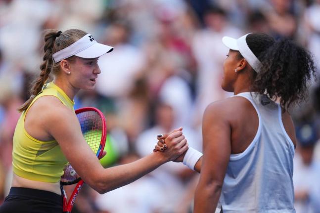 Elena Rybakina, of Kazakhstan (left) greets Naomi Osaka, of Japan, after winning a match during the fourth round of the US Open tennis championships yesterday.