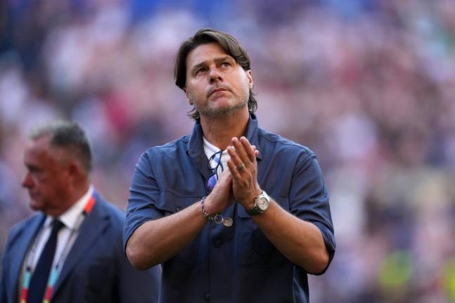 United States head coach Mauricio Pochettino walks off the field after the United States lost a World Cup round-of-16 football match against Belgium in Seattle, July 6.