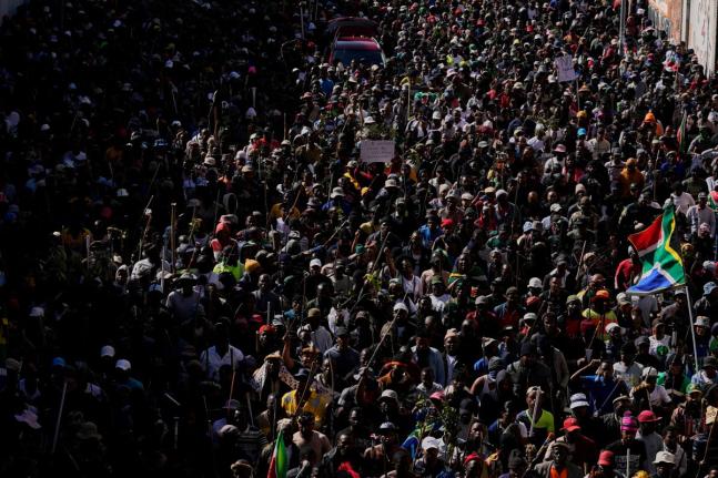 Protesters march against illegal immigration, in Johannesburg, South Africa, on June 30.