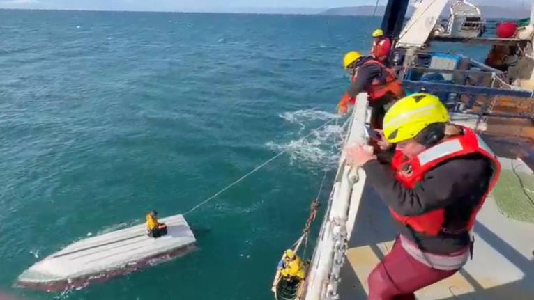 AP 
This image taken from video provided by Carlos Alexis Escartin shows a teenager being rescued by a fishing vessel Monday, September 7, 2026, in the Bering Sea near St Lawrence Island, Alaska.