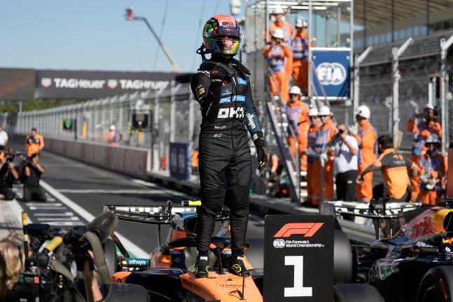 
McLaren driver Lando Norris of Britain celebrates his pole position after the qualifying session for the Spanish Formula One Grand Prix in Madrid, yesterday.