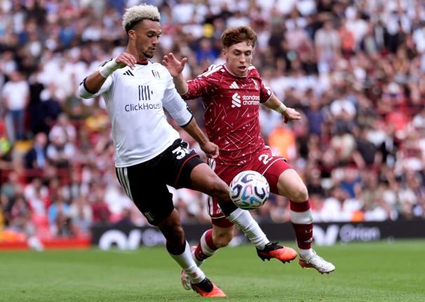 
Fulham’s Antonee Robinson, left, and Liverpool’s Victor Munoz battle for the ball during the English Premier League football match in Liverpool, England, yesterday.
