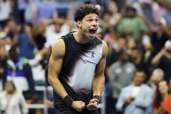 
Ben Shelton, of the United States, celebrates after winning against Carlos Alcaraz, of Spain, in the quarterfinal round of the U.S. Open tennis championships on Wednesday.