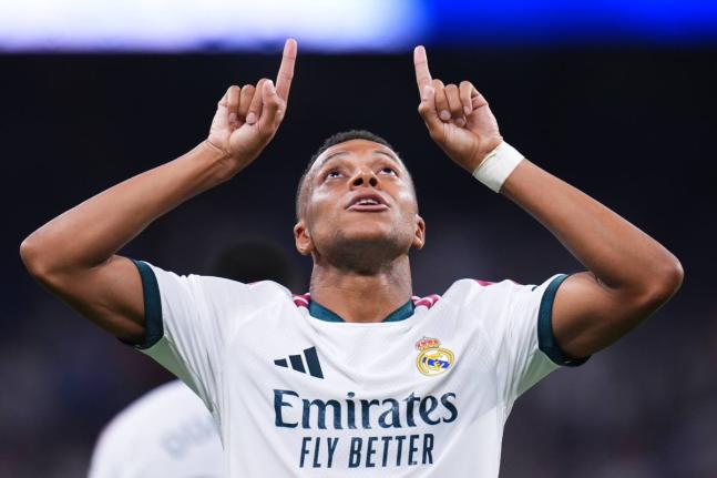 
Real Madrid’s Kylian Mbappe celebrates scoring his side’s fourth goal during the Spanish La Liga football match against Rayo Vallecano in Madrid, Spain, yesterday.