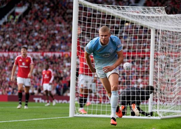Manchester City’s Erling Haaland celebrates after scoring his side’s winning goal during the English Premier League match against Manchester United in Manchester, England, yesterday.