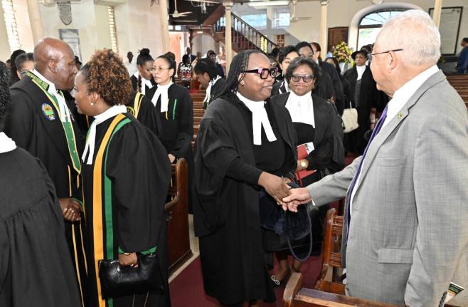 Chief Justice Bryan Sykes (left) greets members of the judiciary while Justice Minister Delroy Chuck (right) greets Director of Public Prosecutions Claudette Thompson (third right) and Denise E. Kitson, KC, (second right), chairman of the General Legal Cou