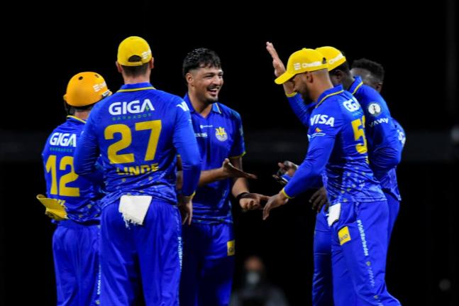 The Barbados Tridents celebrate a wicket ding their Republic Bank Caribbean Premier League game against the Guyana Amazon Warriors at the Kensington Oval in Barbados on Sunday night.