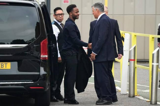 Former England football player Raheem Sterling, second left, arrives at Basingstoke Magistrates’ Court ahead of his first appearance accused of dangerous driving in Hampshire, England, Tuesday, September 15, 2026. 