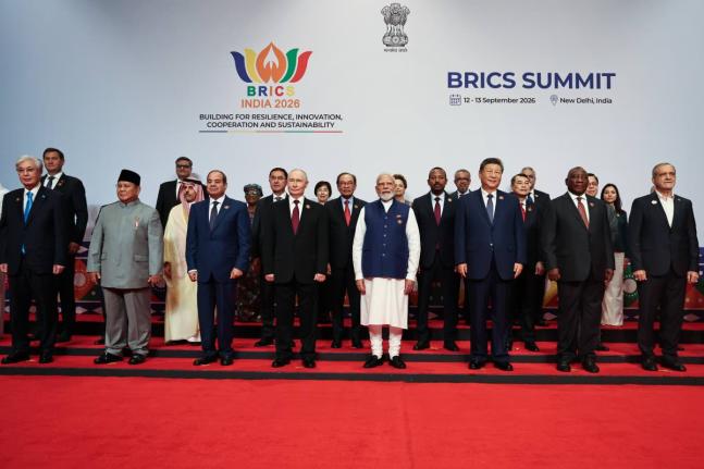 Participants of the BRICS Plus Outreach format pose for a photo in New Delhi, India, on Sunday, September 13, 2026. (Alexander Kazakov, Sputnik, Kremlin Pool Photo via AP)