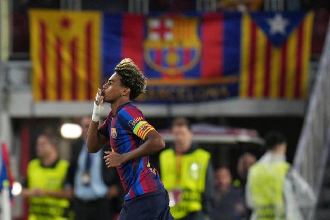 Barcelona’s Lamine Yamal celebrates after scoring his side’s fourth goal during the Champions League opening phase football game against Feyenoord in Barcelona, Spain, September 9.