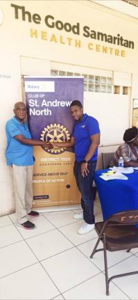Vermont Murray (left), project manager of the Good Samaritan Inn, shares a moment with Patrick Forrest, president of the Rotary Club of St Andrew North, during the Back-to-School Health Fair at the Inn’s drop-in centre on September 6. Through a partnersh