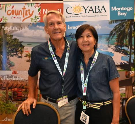 Kevin and Joanne Robertson, owners of Coyaba Beach Resort & Club in Montego Bay, pose in the exhibition hall during Day 2 at Jamaica Product Exchange (JAPEX) at the Moon Palace Jamaica on Tuesday.