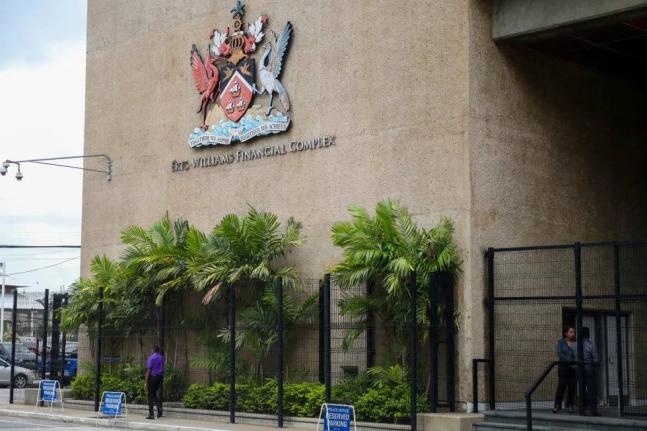 The country’s coat of arms hangs on the facade of a government building in Port-of-Spain, Trinidad and Tobago.