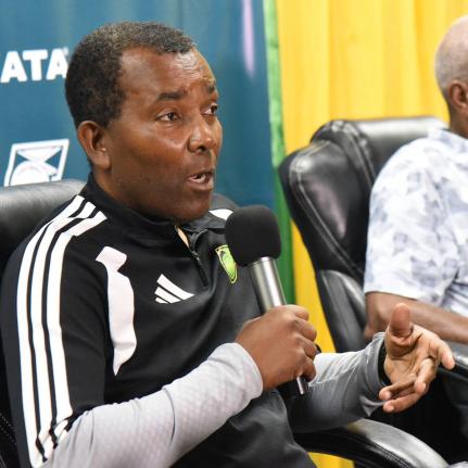 Rudolph Speid, Jamaica's Reggae Boyz Interim Head Coach, announces the Jamaica Football Federation (JFF) Nations League Squad at the JFF Offices in Kingston on Friday.  Looking on is Barry Watson (right), Vice President of the Jamaica Football Federation (