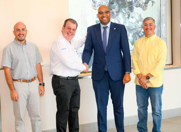 Minister of State in the Ministry of Industry, Investment and Commerce, Delano Seiveright (second right), with senior LANCO executives following discussions at the AC Hotel in Kingston on Wednesday. From left are: LANCO Chief Engineering Officer, Esteban S