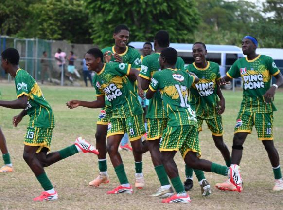 Ocho Rios High’s players celebrate after scoring a goal against Little London High during their opening match of the ISSA Ben Francis KO competition at Drax Hall Sports Complex yesterday. 