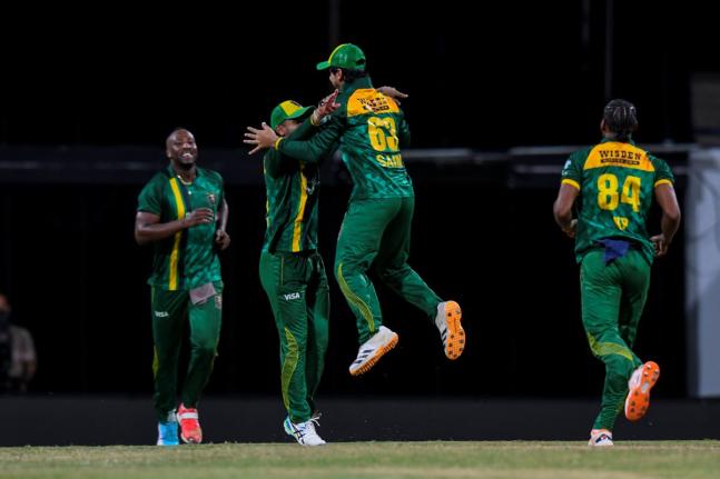 Courtesy of CPLT20 
Jamaica Kingsmen celebrate a wicket during their Republic Bank Caribbean Premier League cricket game against the Guyana Amazon Warriors on Friday.