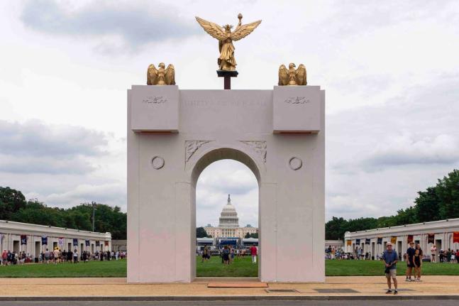 A mockup of President Donald Trump’s proposed triumphal arch stands at the Great American State Fair on the National Mall, in Washington DC. 