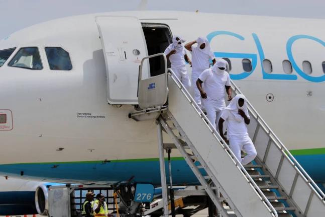 Haitians deported from the United States deplane at the international airport in Cap-Haïtien, Haiti, Thursday, August 27, 2026.