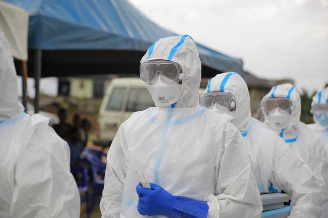 Ebola response teams organize a public demonstration to raise awareness about the Ebola virus disease in Beni, North Kivu province, eastern Congo, Tuesday, Sept. 22, 2026. (AP Photo/Sebastien Kitsa Musayi)