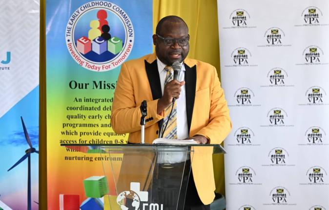 Otis Brown, Director of Regional Education Services in the Ministry of Education, Skills, Youth and Information, delivers remarks during the official launch of the 2026/2027 Trees for Peace Competition on Monday at Tavares Gardens Primary School in Kingsto