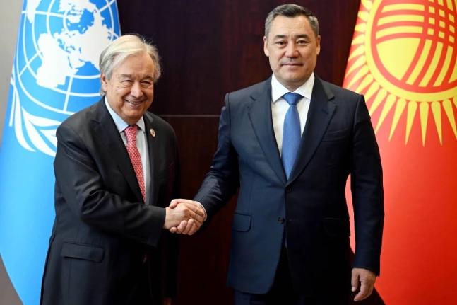 APIn this photo provided by Kyrgyzstan’s Presidential Press Office, United Nations Secretary-General Antonio Guterres (left) and Kyrgyz President Sadyr Zhaparov shake hands during their meeting on the sidelines of the Shanghai Cooperation Organization S