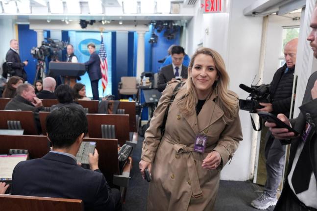 CNN Senior Reporter Betsy Klein walks through the James Brady Press Briefing Room at the White House in Washington on Thursday.