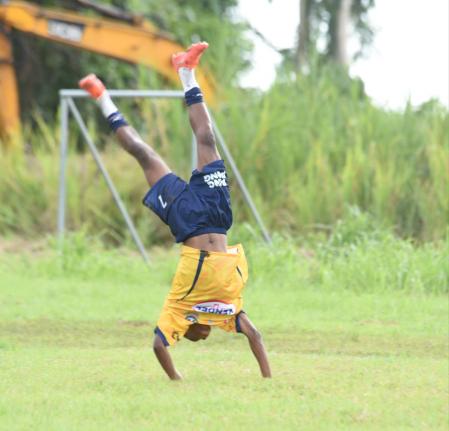 
Munro College’s Jaquan Mitchell does a somersault to celebrate his goal against Frome Technical during their ISSA Ben Francis Knockout Tournament round-of-32 match at Frome yesterday.