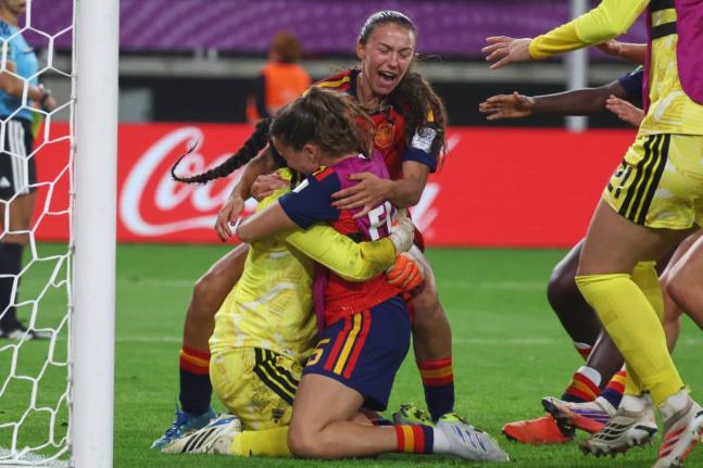 Spain’s players celebrate after their penalty shootout win over North Korea in the Women’s U20 World Cup final  match in Lodz, Poland yesterday.  