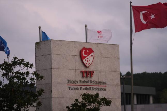 A Turkish flag waves at the Turkish Football Federation headquarters, in Istanbul on November 12, 2025. 